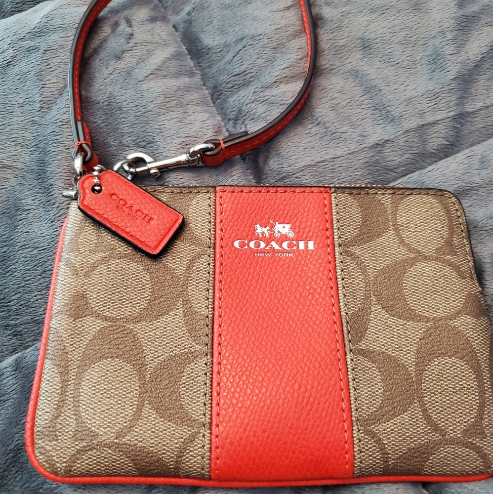 COACH colorblock signature orange wristlet